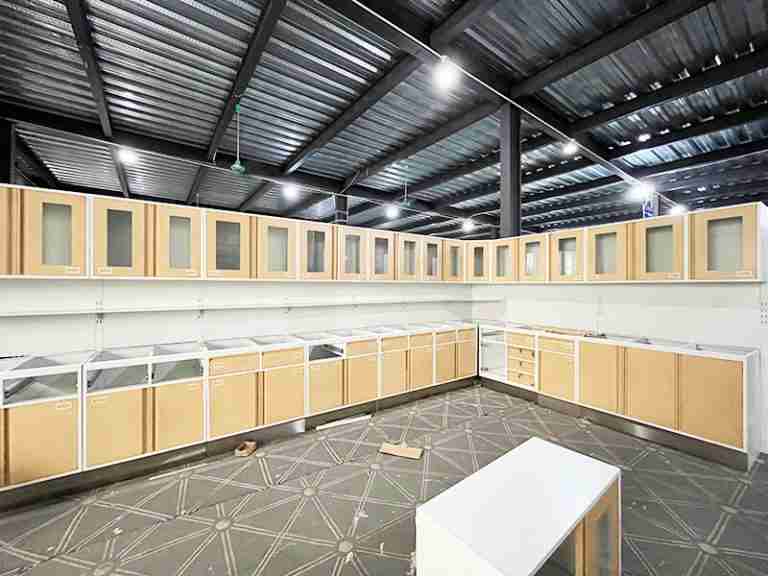 A durable, steel medical treatment cabinet with multiple drawers and a cleanable surface